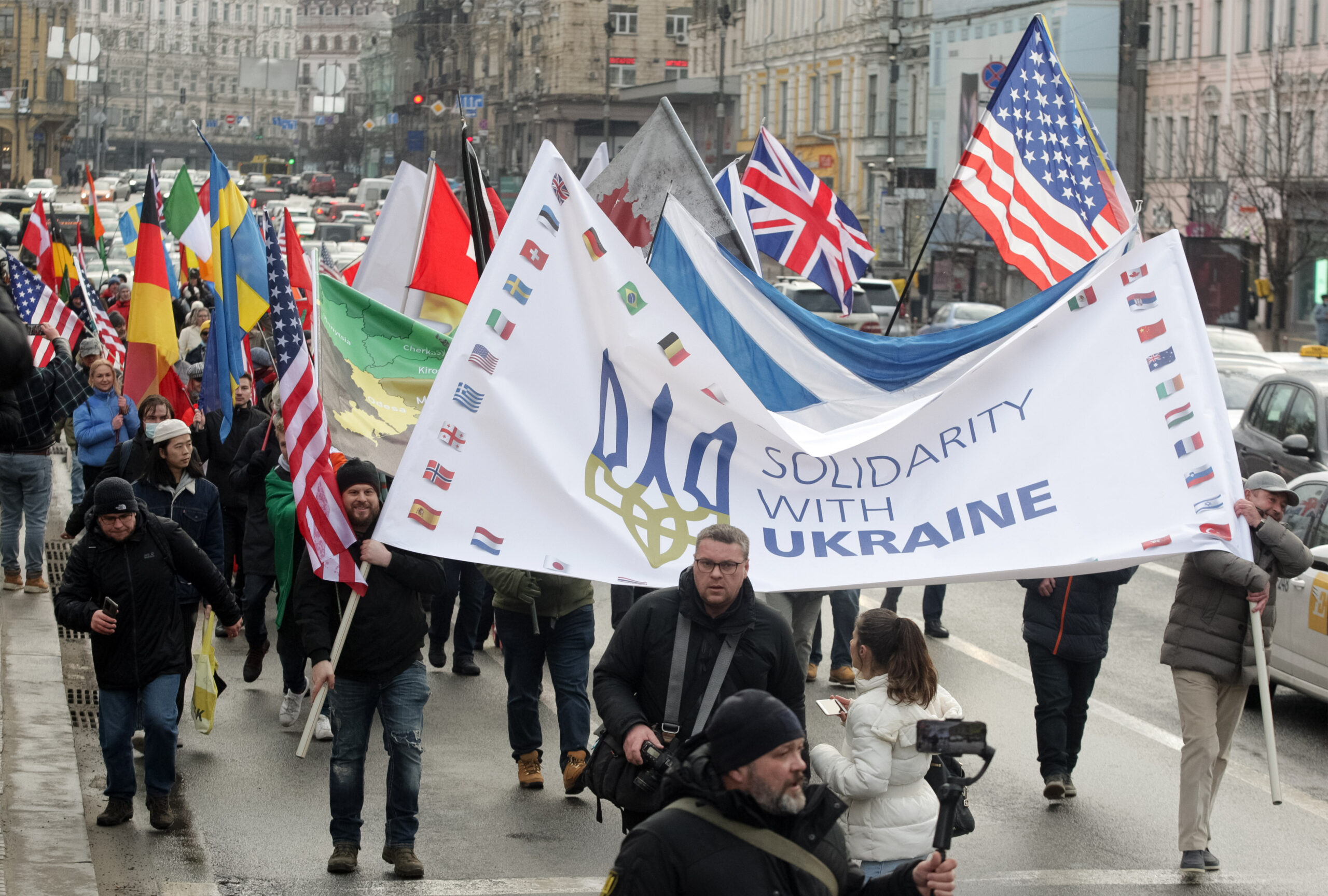 Putin appears at big rally as troops press attack in Ukraine